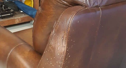Upholstery piece before restoration by SouthPaw Upholstery